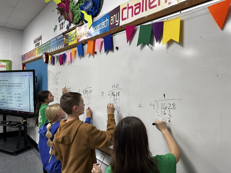 at the board