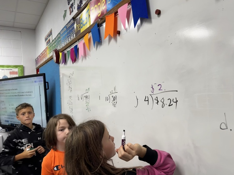 at the board