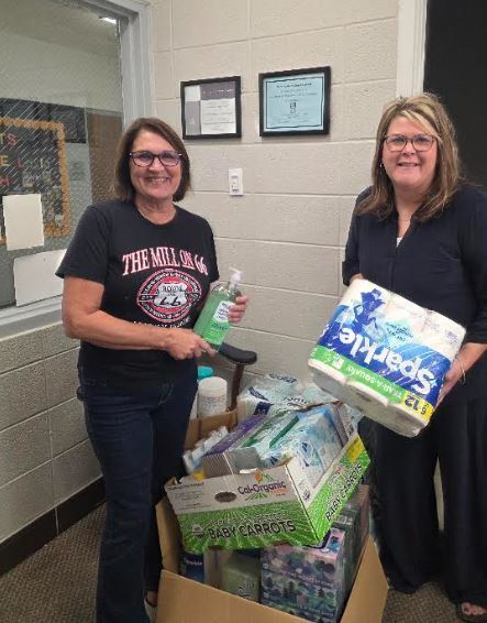 Senator Turner dropping off supplies to the district with Mrs. Shaver
