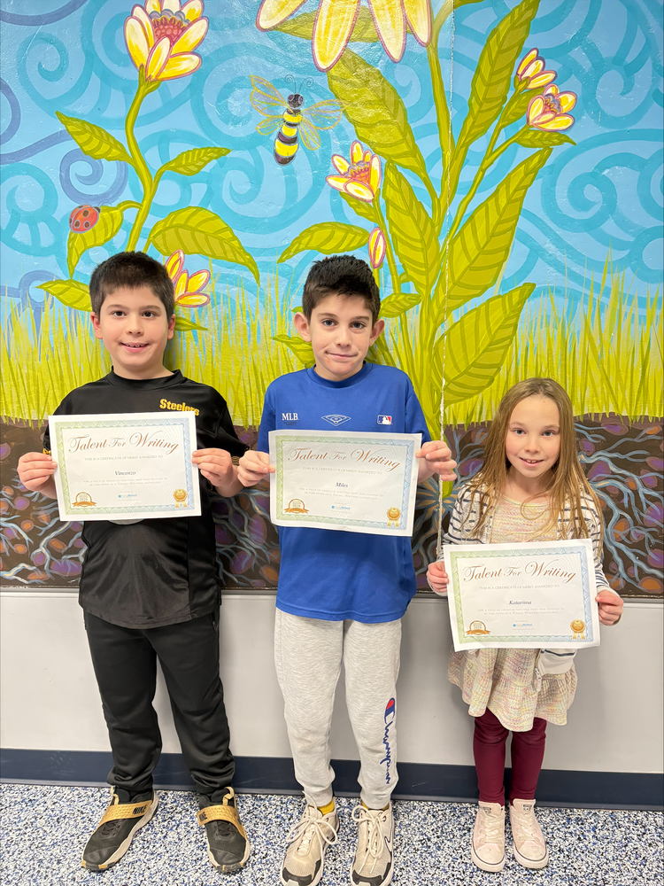 Three Students Holding Certificates