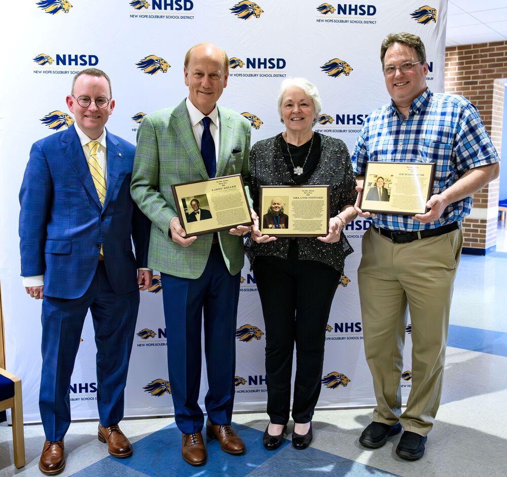 Dr. Lentz, Larry Keller, Melanie Pittner, Richard Bush with plagues
