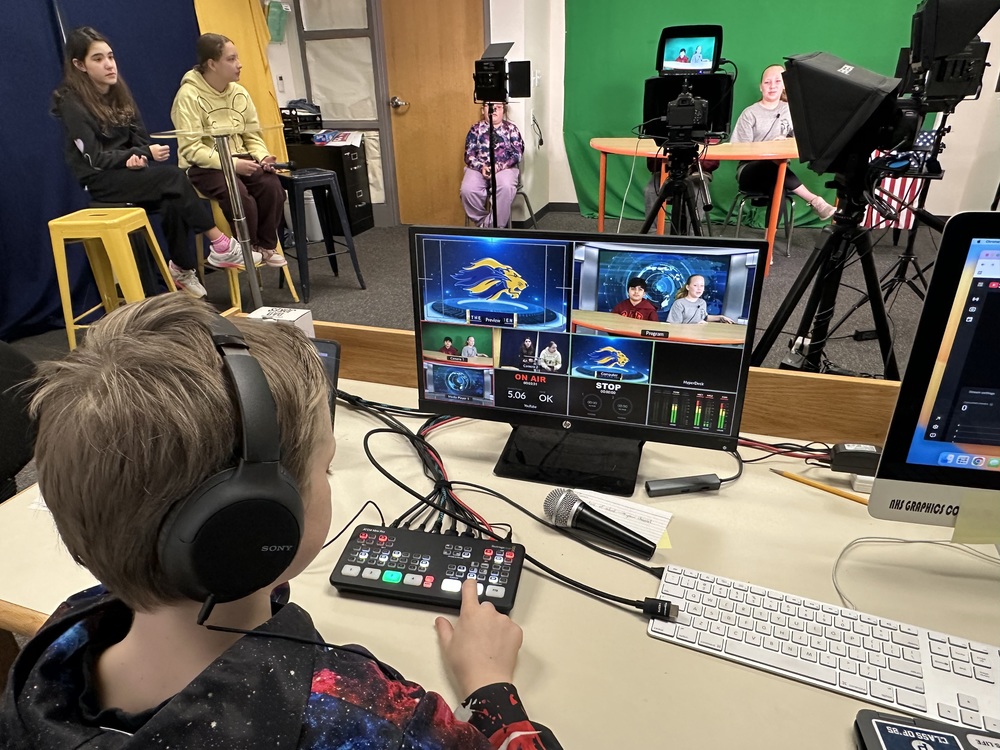 Student looking at production screen