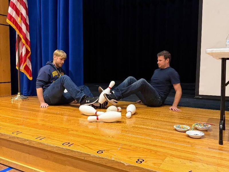 Middle School teachers compete at Blue/Gold Assembly