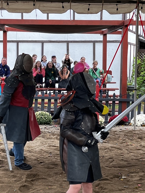 7th grade students at Pa Renaissance Faire sword fighting