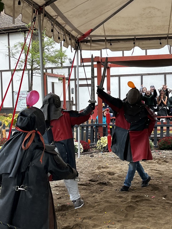 7th grade students at Pa Renaissance Faire sword fighting