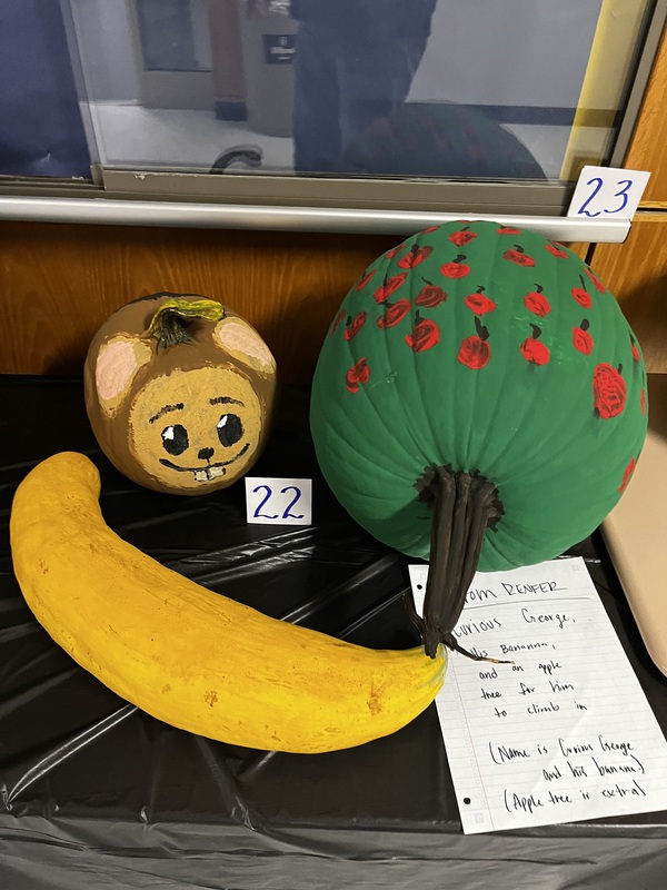 Middle School pumpkin decorating, monkey and banana