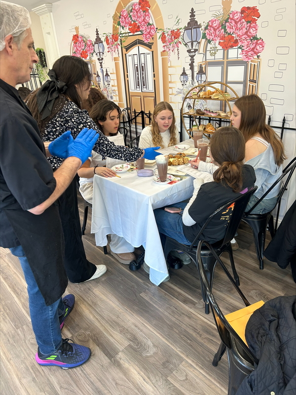 Student on their French Class Field Trip to  Chez Alice!