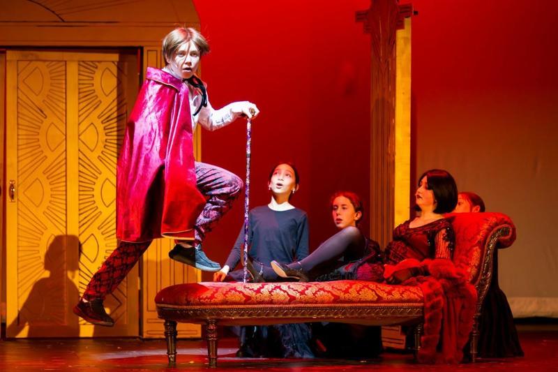 Middle Schoolstudents on stage performing Drowsy Chaperone Jr.