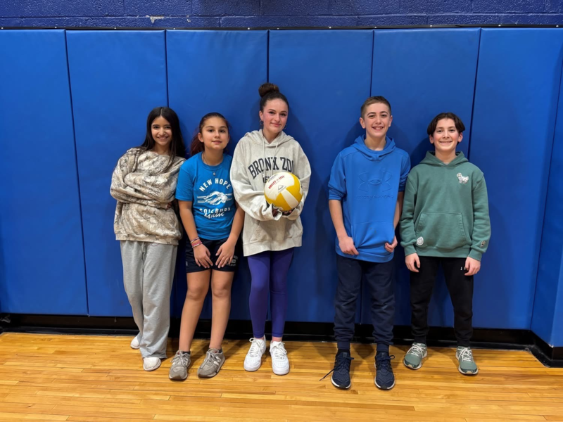 Middle school students in the gym for volleyball