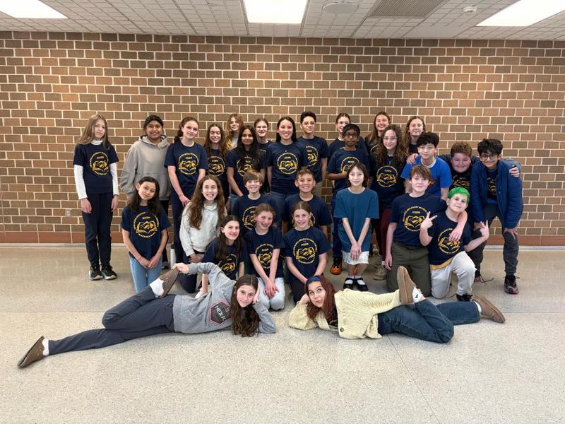 Reading Olympics Students gathered around