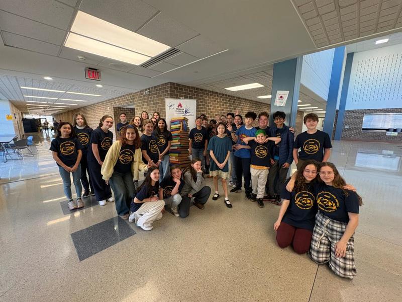 Reading Olympics Students gathered around