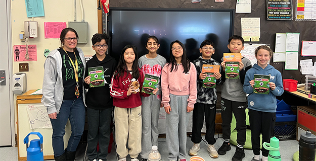 Writing contest winners with teacher.