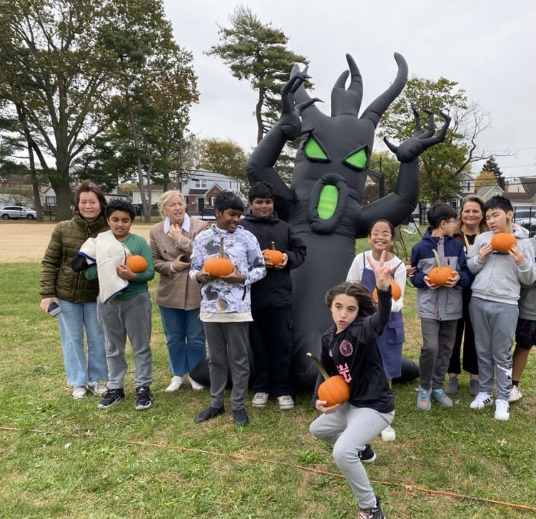 kids picking pumpkins