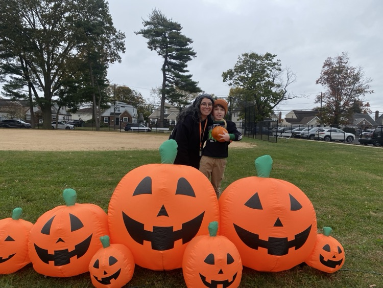 kids picking pumpkins