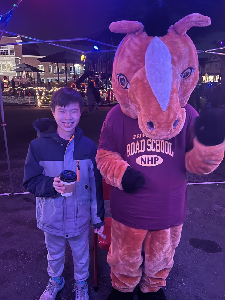 student with a horse mascot