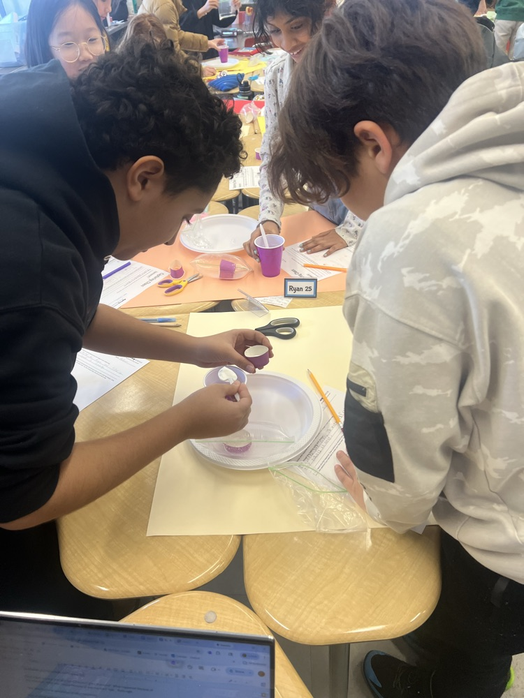 kids working on a science experiment