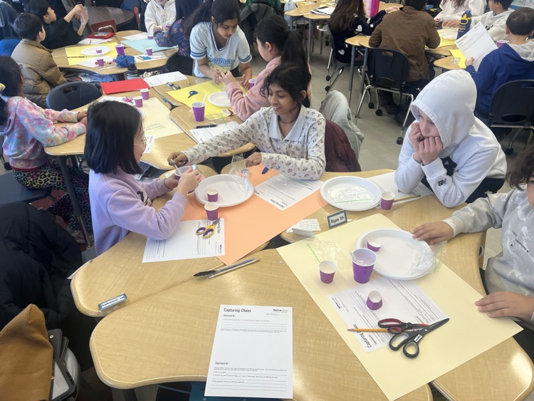 kids working on a science experiment