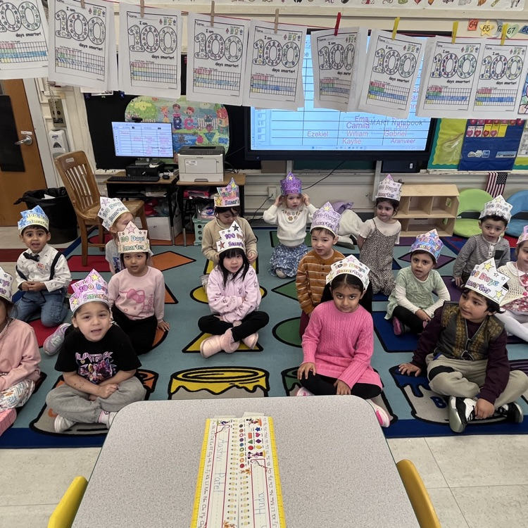 kids sitting on carpet 