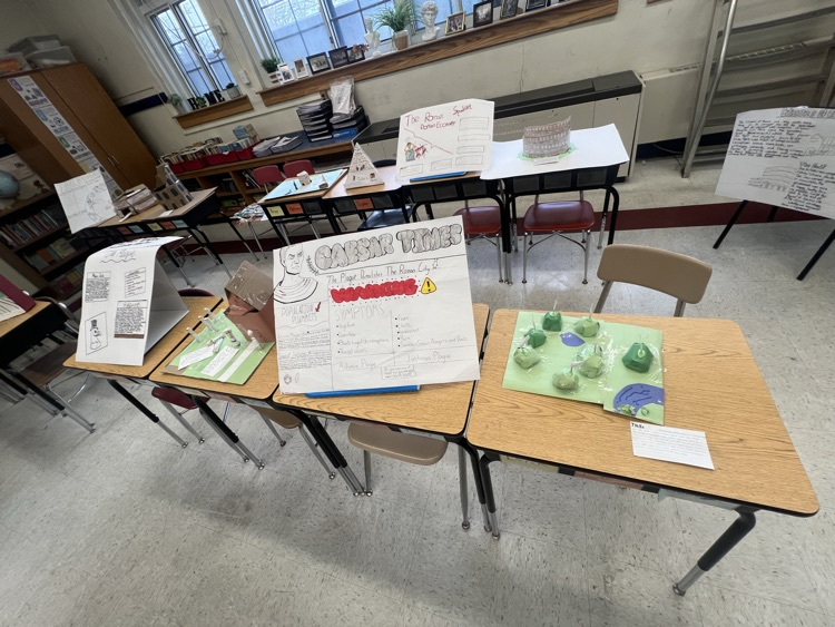 kids looking at projects on Ancient Rome