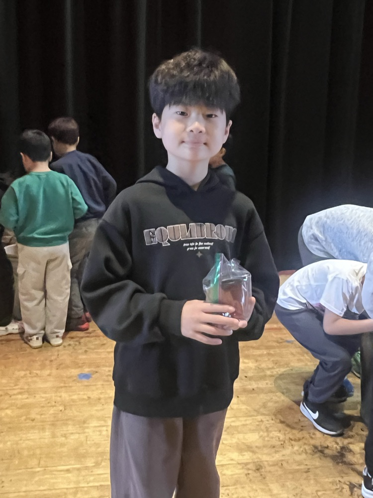 boy with a pod in his hand