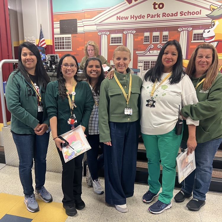 staff and student wearing green