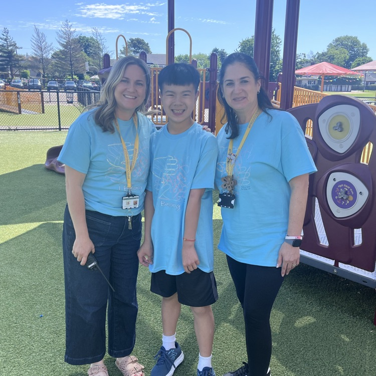 people wearing the same blue shirt