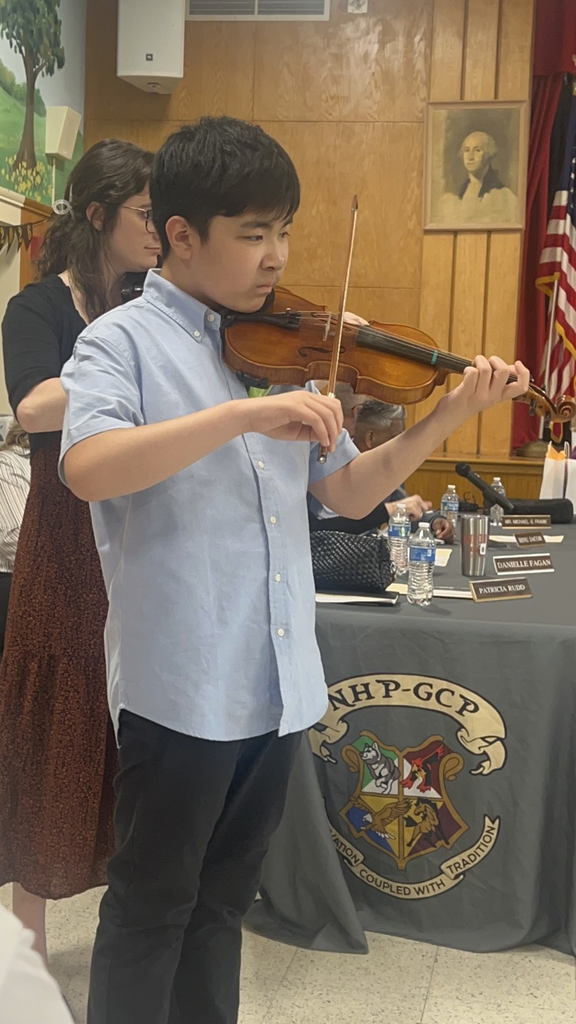 student playing an instrument