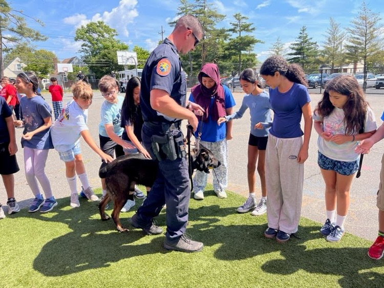 police dog with students