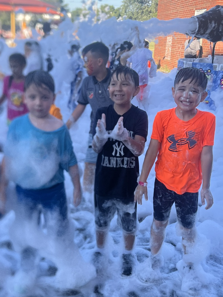 boys covered in foam