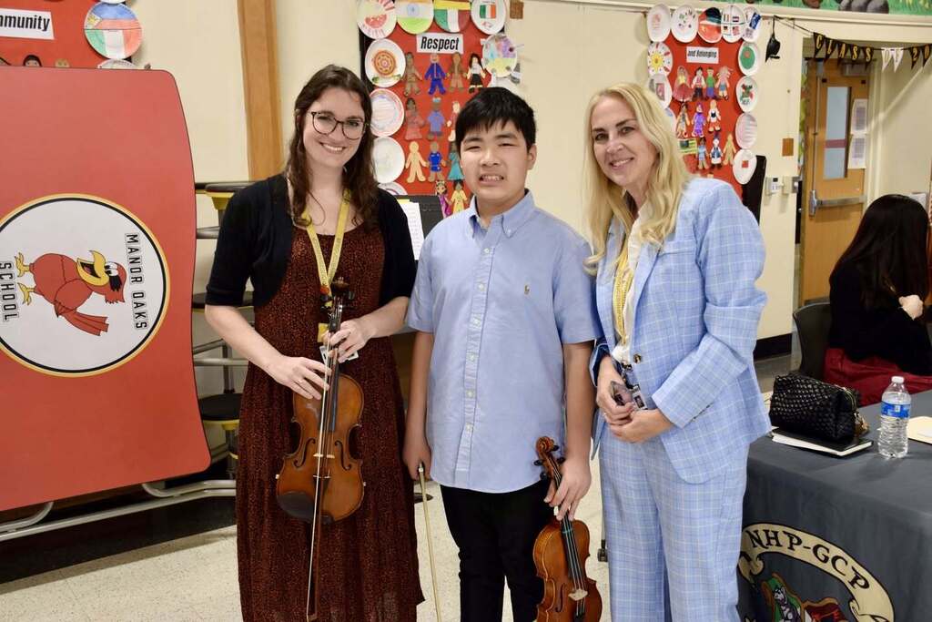 Superintendent Dr. Jennifer Morrison and Jensen Wu with Alyssa Budzynski.