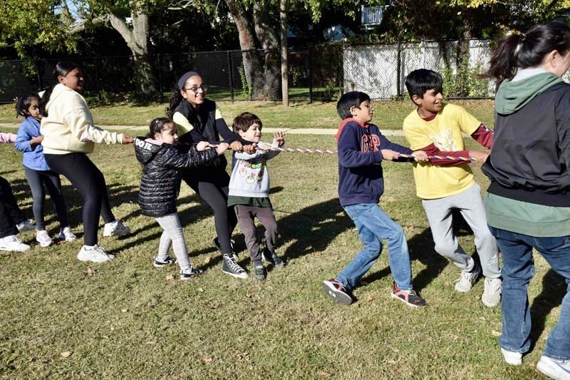 Students standing together outside.