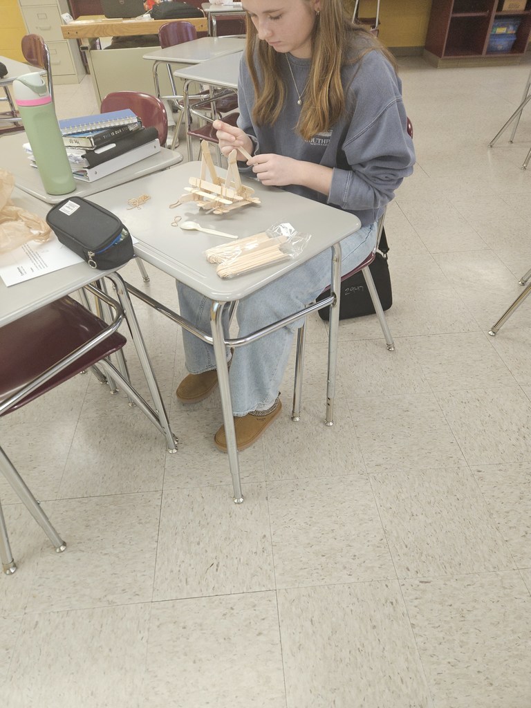 MMR Students making catapults to launch objects.
