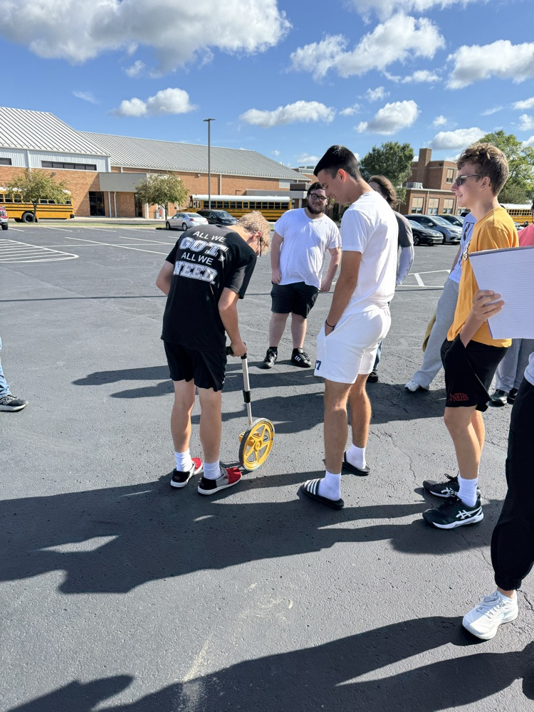 Pre-Calculus class measuring arc length on the surface of the Earth as it relates to latitude and longitude measured in degrees, minutes and seconds .