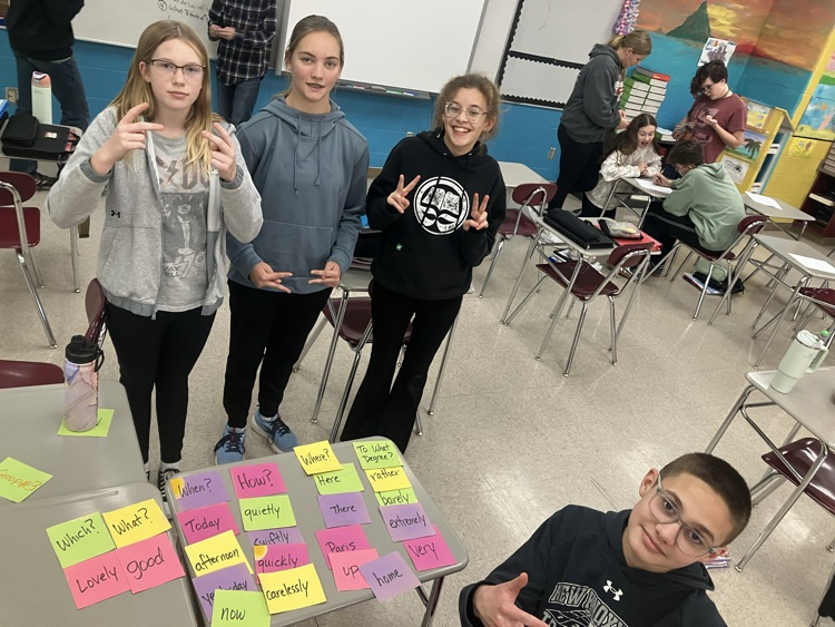 8th graders deciphering between adjectives and adverbs in Mr Sailer’s 8th grade ELA