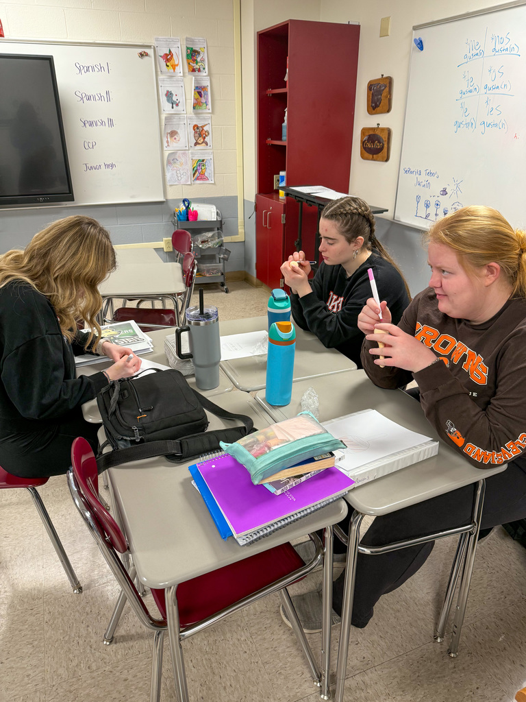 Students decorating maracas.
