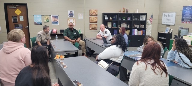 2 Sherifs and and SRO talking to a criminal Justice class