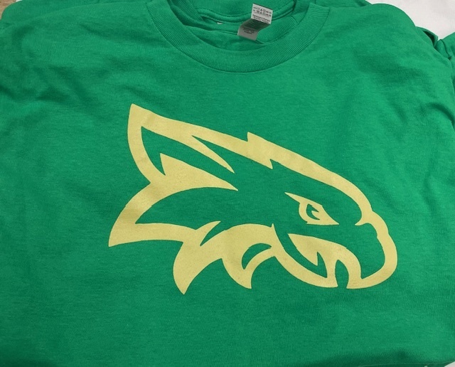 A green T-shirt with an eagle head on it.