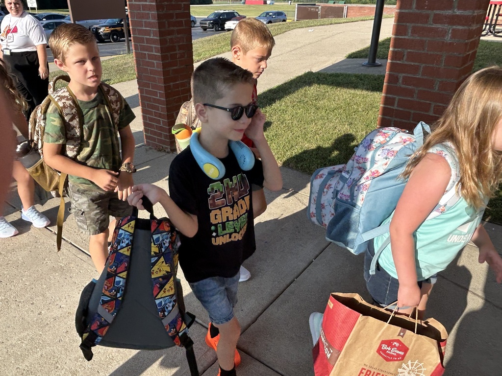 Students enter Monroe Elementary on the first day of school