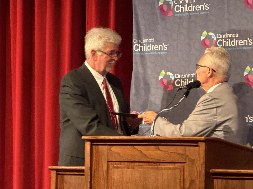 David Painter presents John Frye with a proclamation from the Clermont County Board of Commissioners