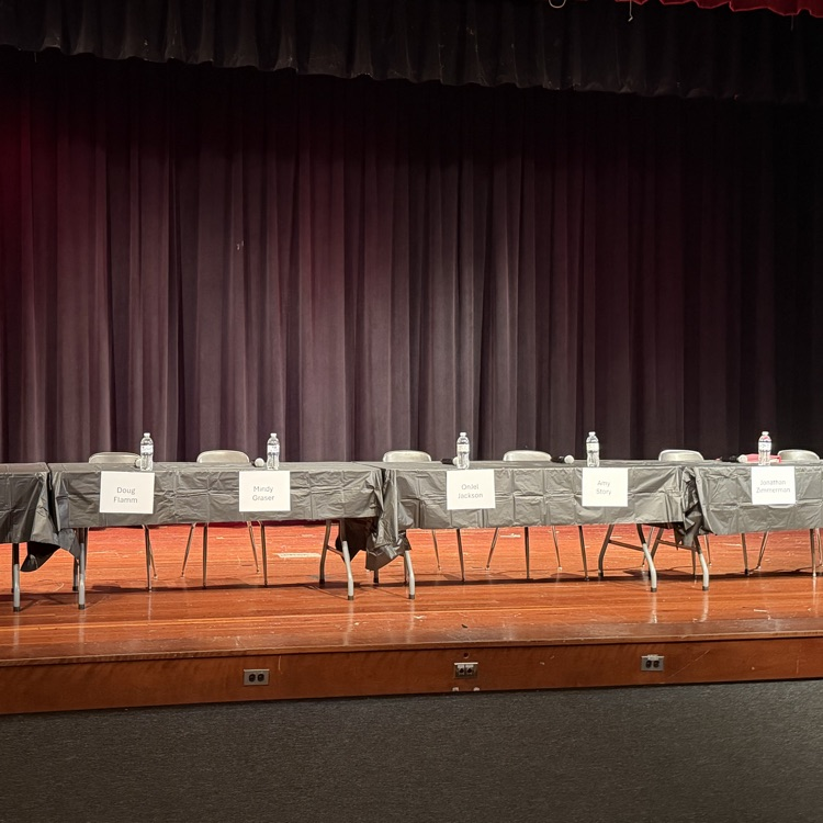 A photo of the stage without any of the candidates on it before the event begins