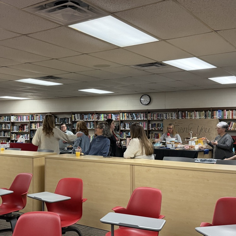 Staff members celebrate Deputy Goldsmith