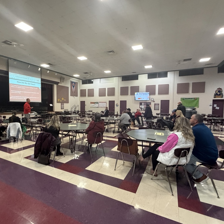 a photo from the cafeteria at locust corner elementary showing the final community forum meeting