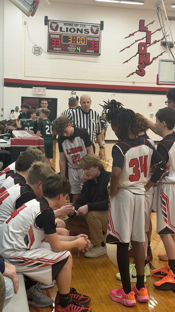 Coach Rudd coaching the team to a W in OT against Batavia MS.