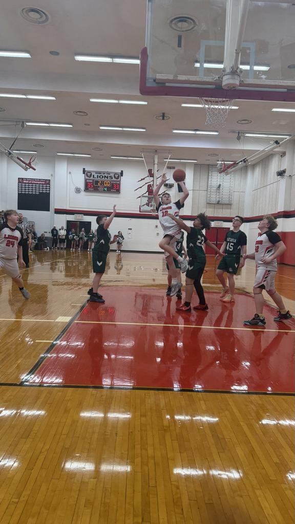 #12 Henry Carlton goes for a shot.