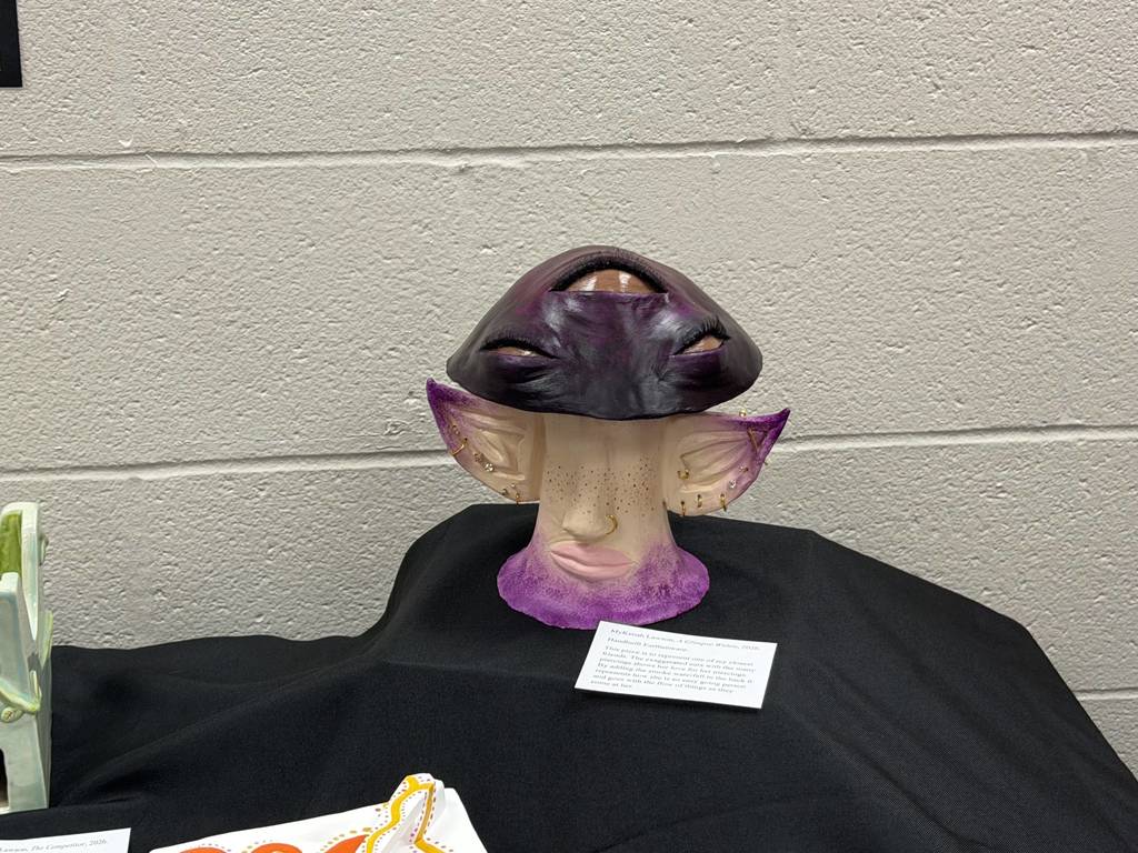 a sculpted mushroom with facial features