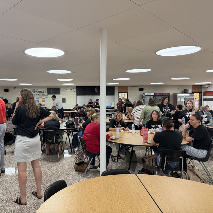 the staff of NREVSD gathers for breakfast prior to convocation 