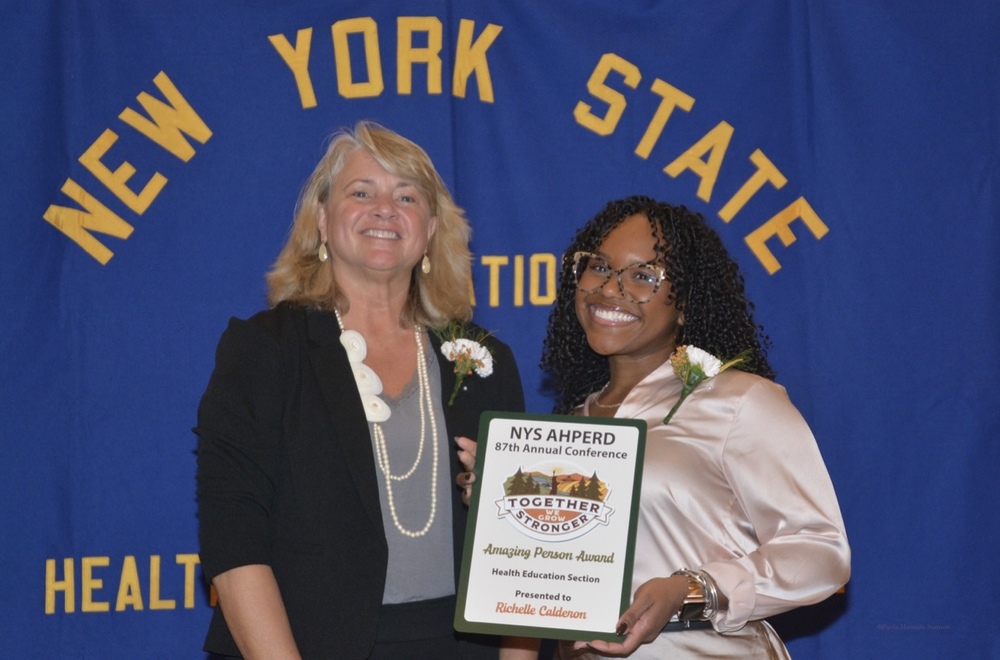 A photo of Richelle Calderon  receiving her award