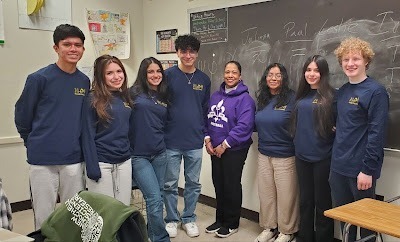 A photo of the Math Honor Society members with their Advisor, Ms. Daniel