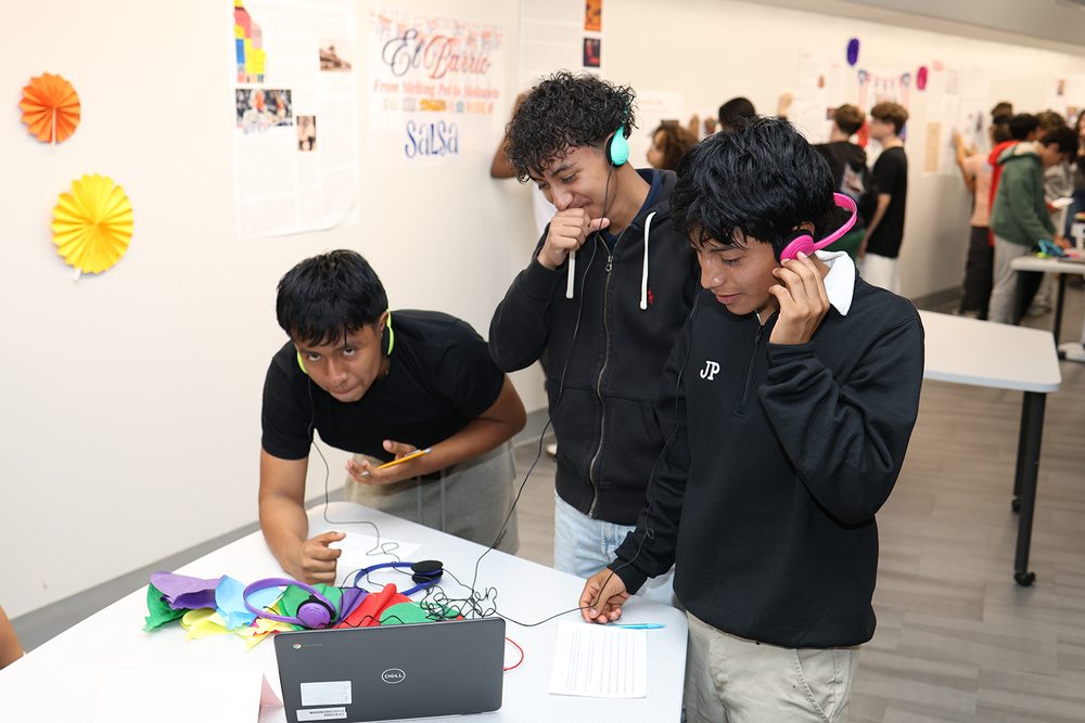 students listening to music on headphones