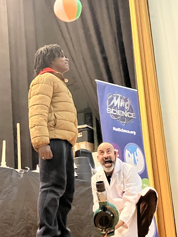 a student participating in a science experiment